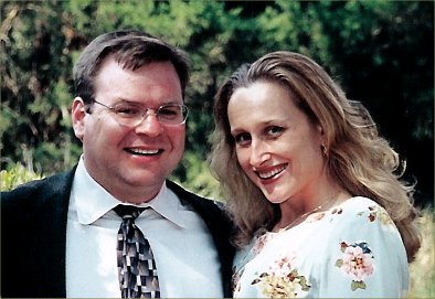Russ and Maxine, happy as pigs in mud.