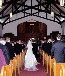 Walton walking Maxine down the aisle